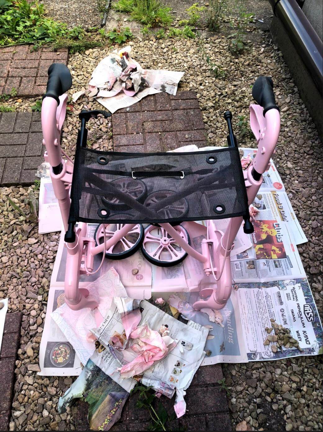 peeling off the tape and newspaper to reveal the walker