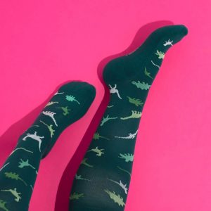 Dinosaur compression socks on a dark pink background