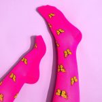 Butterfly Compression Socks on a lilac background