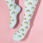 light green compression socks with a rainbow pattern